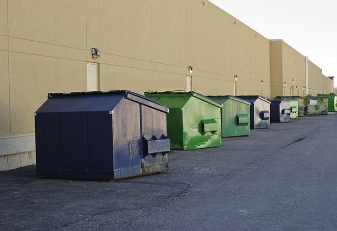 several large trash cans setup for proper construction site cleanup in Kiowa, CO